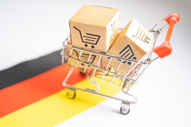 Box mit Online-Einkaufswagen-Logo und deutscher Flagge Import Export Handel Finanzierung Lieferhandel