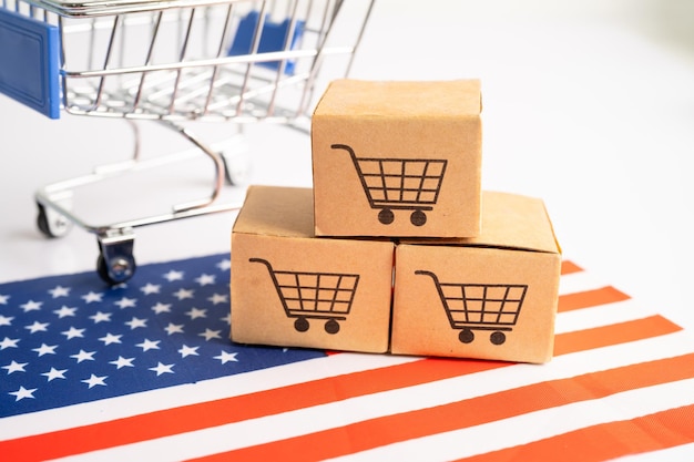 Box mit Warenkorb-Logo und USA-Amerika-Flagge Import Export Online- oder E-Commerce-Finanzlieferservice Store Produktversand Handelslieferantenkonzept