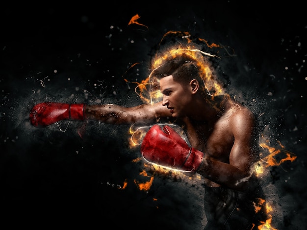 Foto boxeador en una ola de humo y fuego