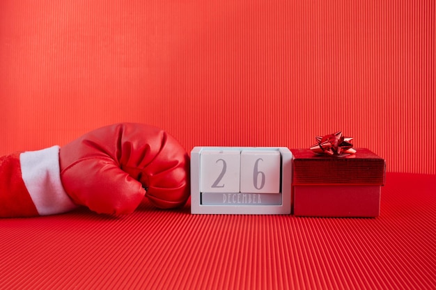 Boxing day shopping idea creativa guante de boxeo con caja de regalo y calendario