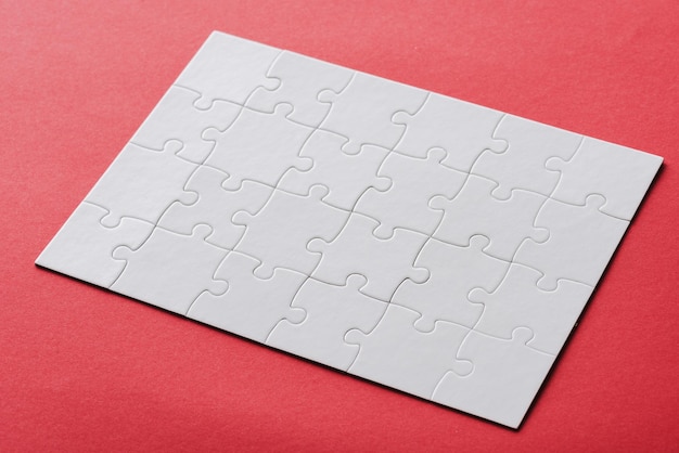 Foto branco conectado quebra-cabeça conectado peças de quebra-cabeça em vermelho