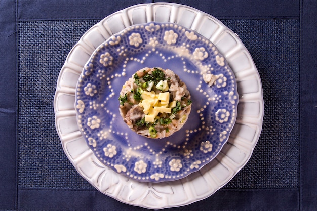 Brasilianisches Essen Baiao, Bohnen mit Reis, Fleisch und Käse.