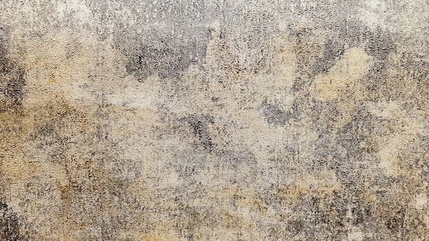 Braune, graue und goldene schmutzige Betonwandputztextur. Dekorative Farbe für Wände oder Grunge-Stil Hintergrund. Dekorativer Putz.