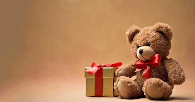 Brauner Teddybär mit roter Geschenkbox Das Konzept des Valentinstag-Weihnachts- oder Geburtstagskonzepts