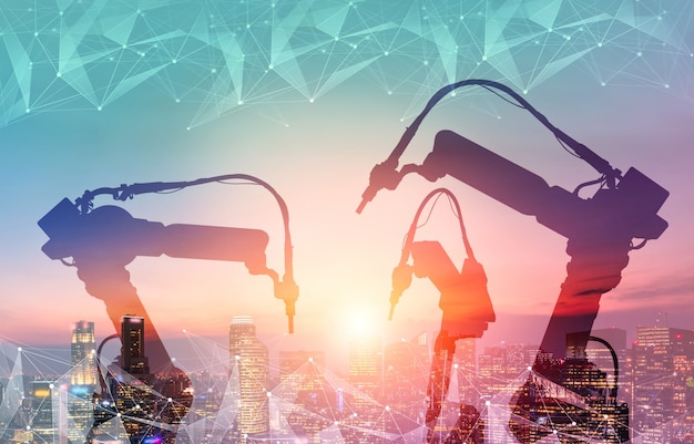 Los brazos robóticos de la industria mecanizada en la fábrica del futuro