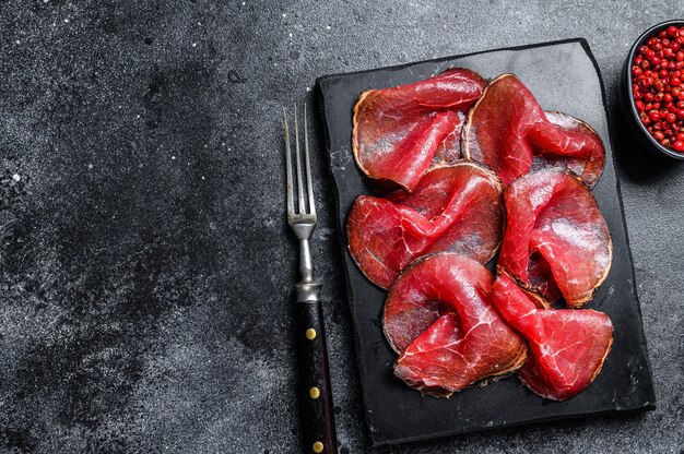 Bresaola embutidos en trozos de ternera, Antipasti italiano.