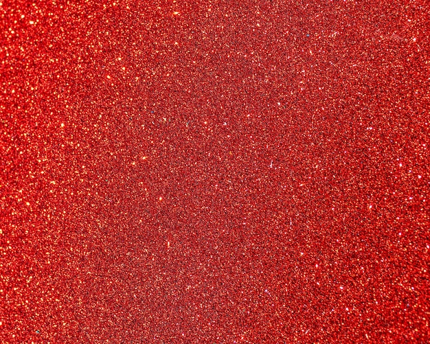 Brilhante vermelho brilhante com pontos amarelos e estrelas de fundo de natal. natal vermelho para suas fotos.