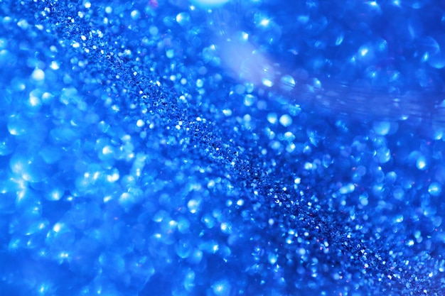 Foto brillo azul con fondo bokeh. textura brillante con reflejos.