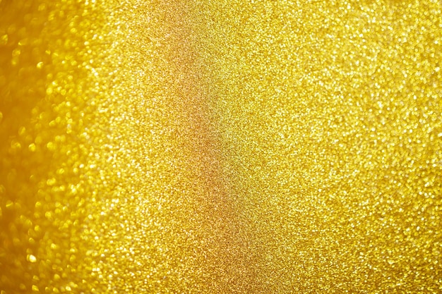 Brillo de brillo dorado abstracto con fondo claro bokeh