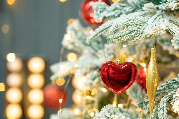 Brinquedo da árvore de natal em forma de coração Feliz Natal e feliz ano novo fundo