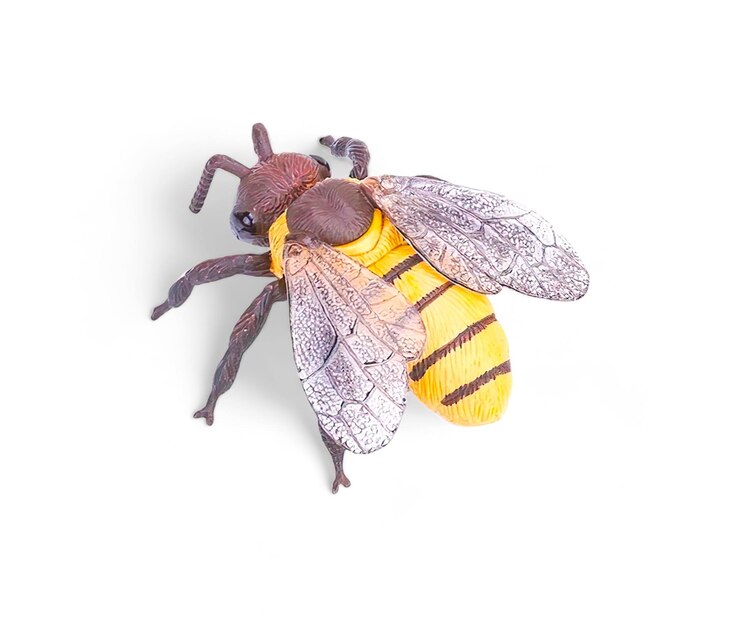 Foto brinquedo de plástico em miniatura de vespa isolado em branco