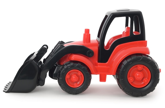 Foto brinquedo de plástico infantil, escavadeira vermelha e preta isolada no branco