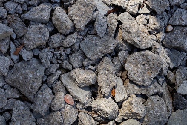 Foto brocken piedra concreta en piso