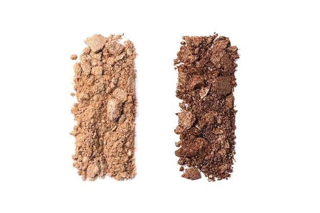 Bronzer-Lidschattenabstrich isoliert auf weißem Hintergrund Bronze und beige glitzernde Lidschatten-Farbmuster