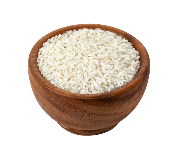 Brown-Holzschale mit trockenem ungekochtem Reiskorn