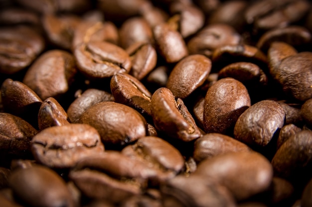 Brown-Kaffeebohnen für Hintergrund und Beschaffenheit