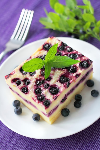 Foto budín de requesón al horno con arándanos