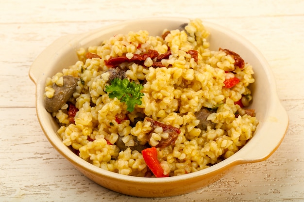 Bulgur con corazones de pollo