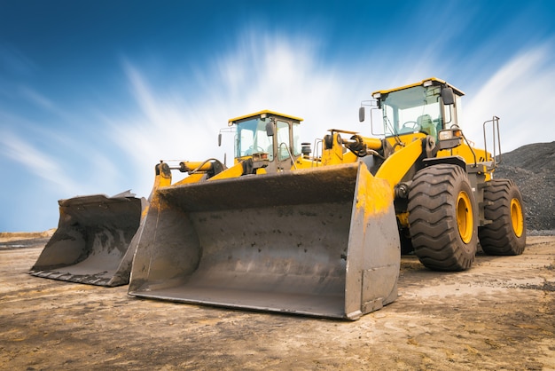 Foto bulldozer en una obra de construcción