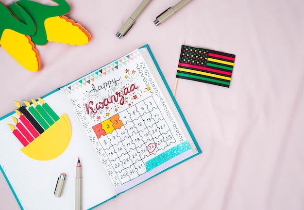 Foto bullet journal casero con calendario kwanzaa