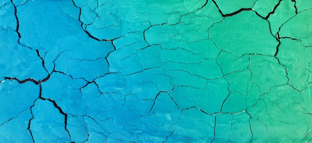 Bunte blaugrüne Risse suface Astract-Hintergrund-Banner-Format