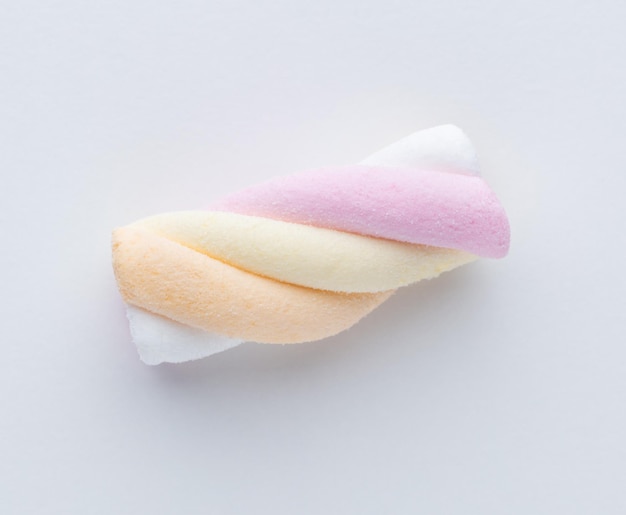 Foto bunte marshmallows auf pastellhintergrund