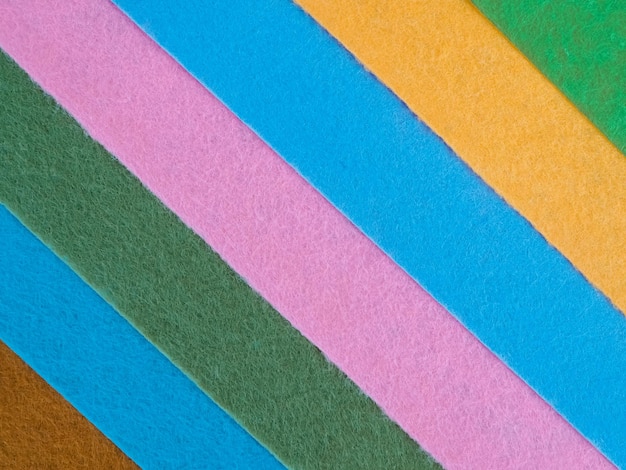 Bunter Hintergrund Ein Stapel von buntem Stoff Full-Frame-Schuss von Muti farbigem Stoffhintergrund