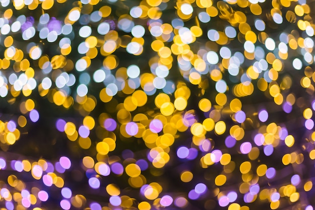 Buntes helles abstraktes Kreis-bokeh von Weihnachts- und guten Rutsch ins Neue Jahrhintergrund.