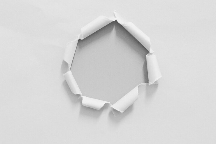 Foto buraco fundo de textura de papel com espaço de cópia para o texto