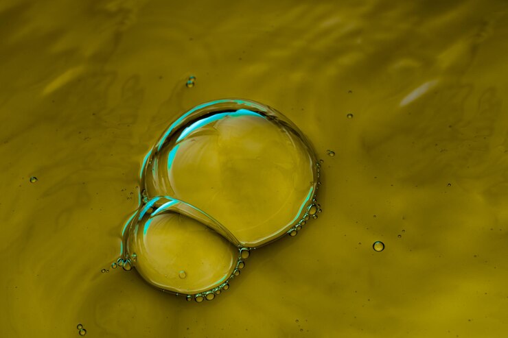 Foto burbujas de agua coloridas sobre el agua como fondo