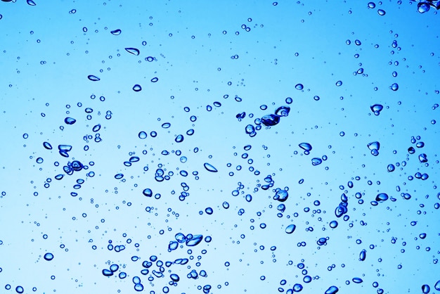 Foto burbujas de aire bajo el agua azul o textura