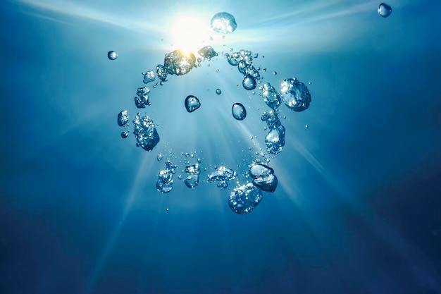 Burbujas de aire submarinas con luz solar. Burbujas de aire de fondo submarino