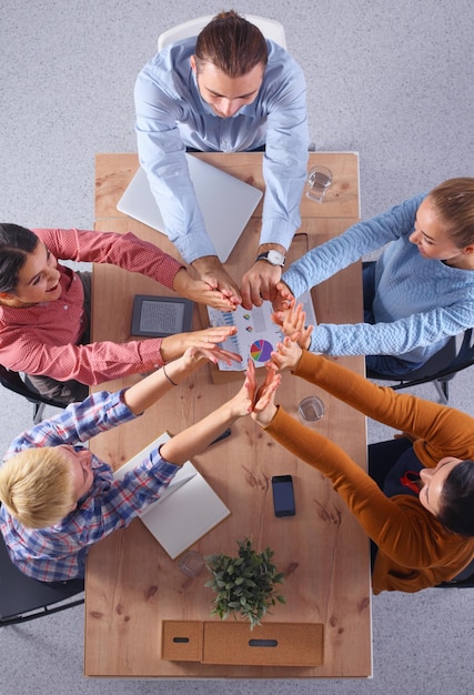 Foto business-team mit händen zusammen teamwork-konzepte