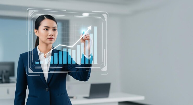 Businesswoman analyzing financial data on a holographic interface