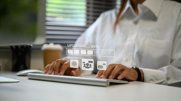 Businesswoman managing software update symbolizing productivity and digital workflow