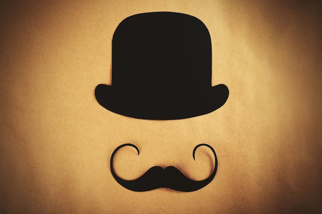 Cabine de fotos adereços bigode em fundo bege