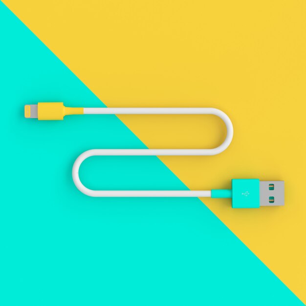 Foto cable usb sobre fondo de dos colores en estilo flatlay.