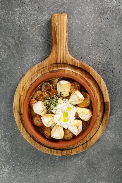 Cacerola de camembert respaldado con patata