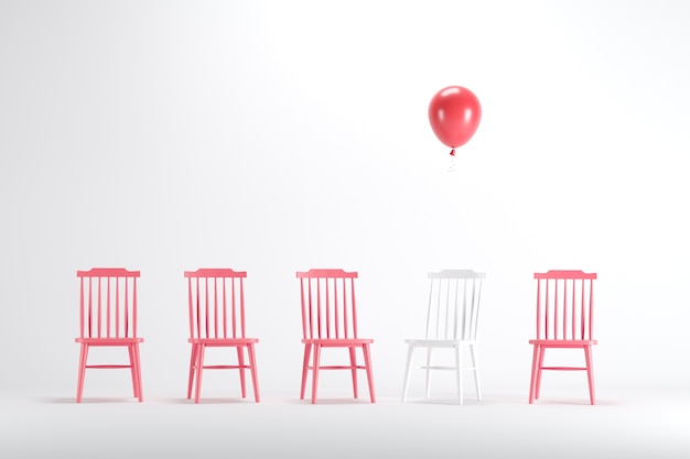 Cadeira branca com balão vermelho flutuante entre a cadeira branca em fundo branco