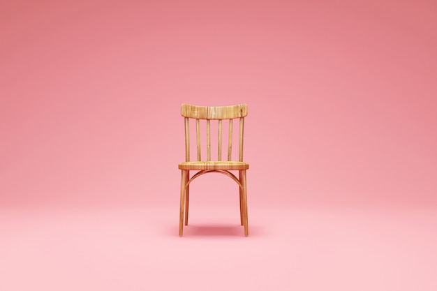 Cadeira de madeira no fundo rosa do estúdio