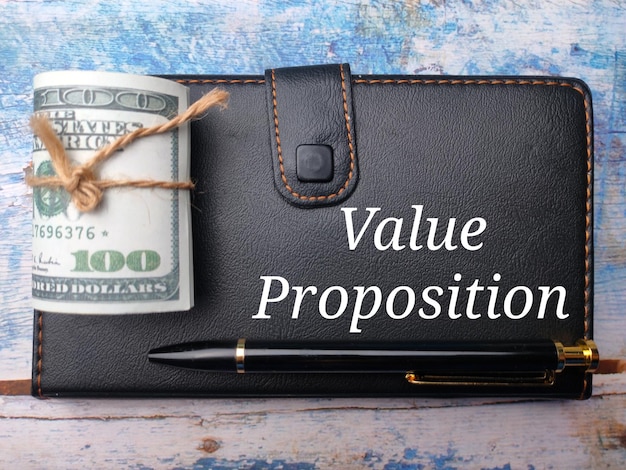 Caderno e notas com a palavra Value Proposition