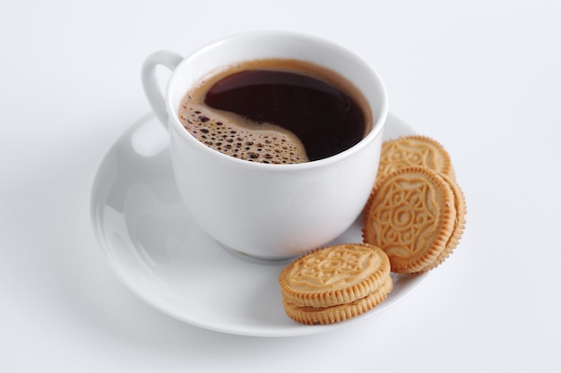 Café e biscoitos com creme