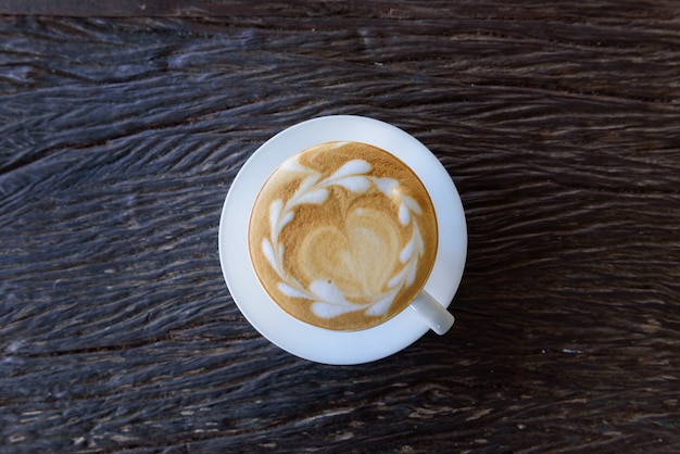 Foto café con leche caliente en la cafetería