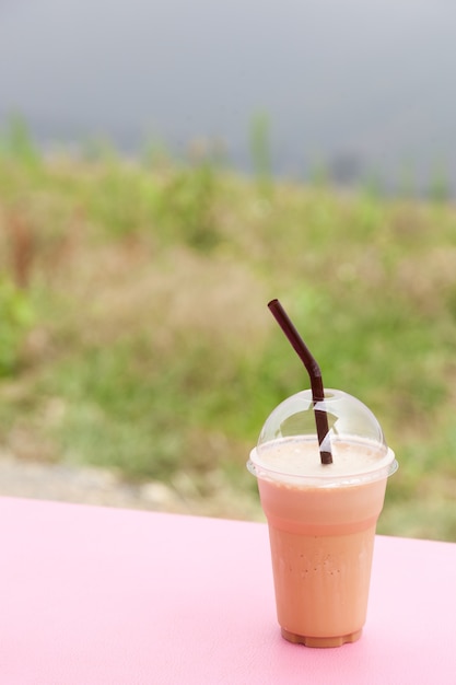 Café en vaso de plástico