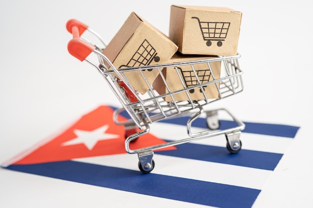 Caixa com o logotipo do carrinho de compras e a bandeira de cuba, importação, exportação, compras on-line ou comércio eletrônico, entrega de produtos da loja de serviços de finanças, comércio, conceito de fornecedor.