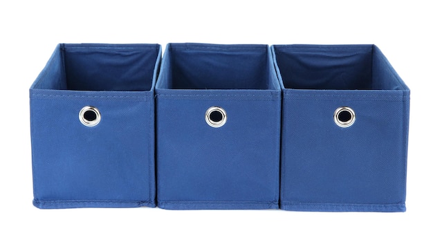 Foto caixas têxteis azuis isoladas em branco