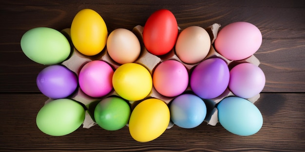 Una caja de huevos coloridos con la palabra pascua