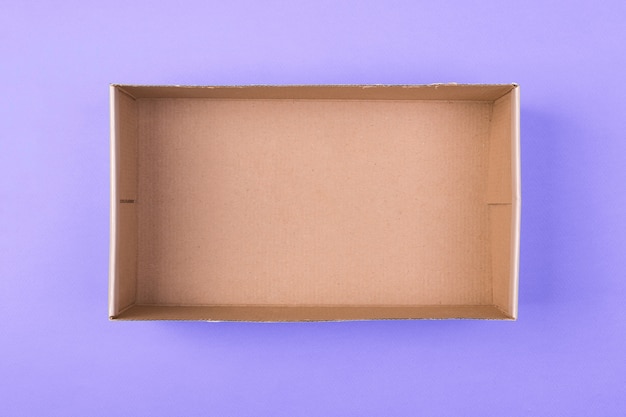 Foto caja de papel de cartón vacía