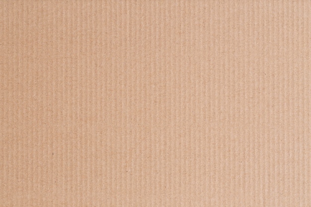 La caja de papel marrón está vacía, fondo abstracto de cartón