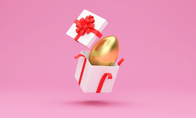 Foto caja de regalo abierta con huevo de pascua dorado en el interior en rosa